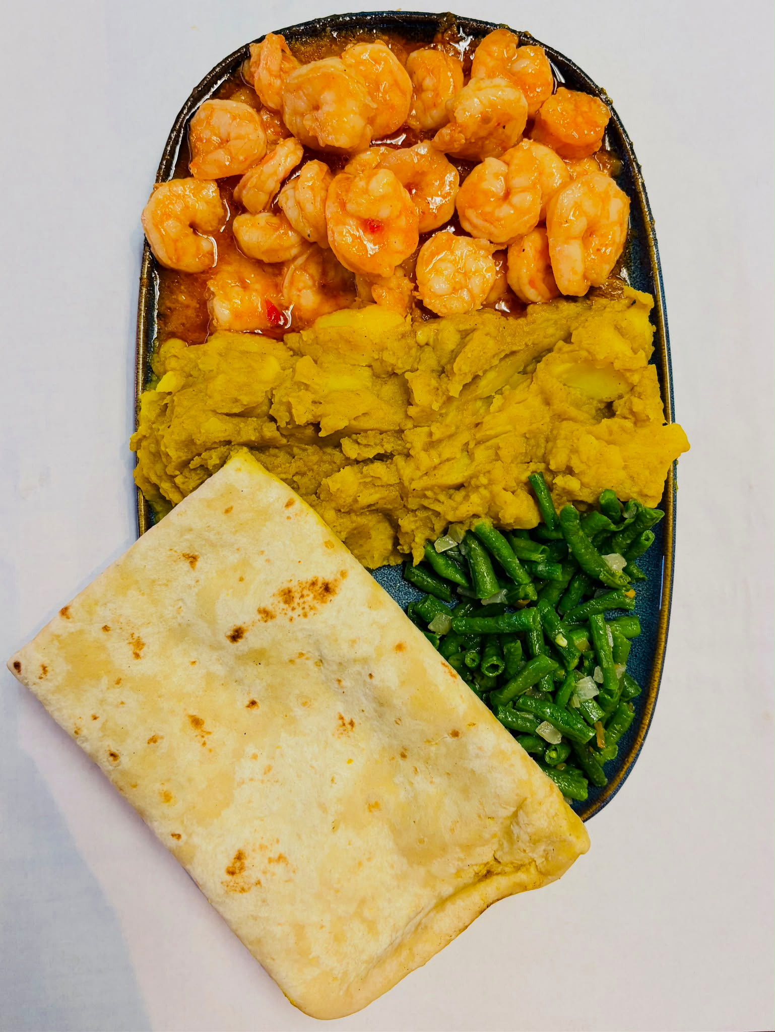 Gerecht uit de eigen keuken van Roti & Spices, foto 5