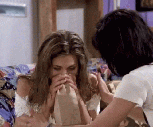 GIF of Rachel from Friends hyperventilating