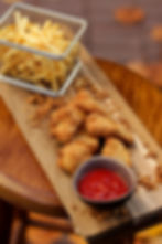 Домашні курячі нагетси з картоплею фрі