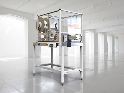 Applicator provides automated can multi-packing for lower volume users