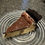 Thumbnail: Brandi’s Reese’s PB ganache covered cheesecake on an Oreo cookie crust