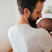 Father Holding Baby