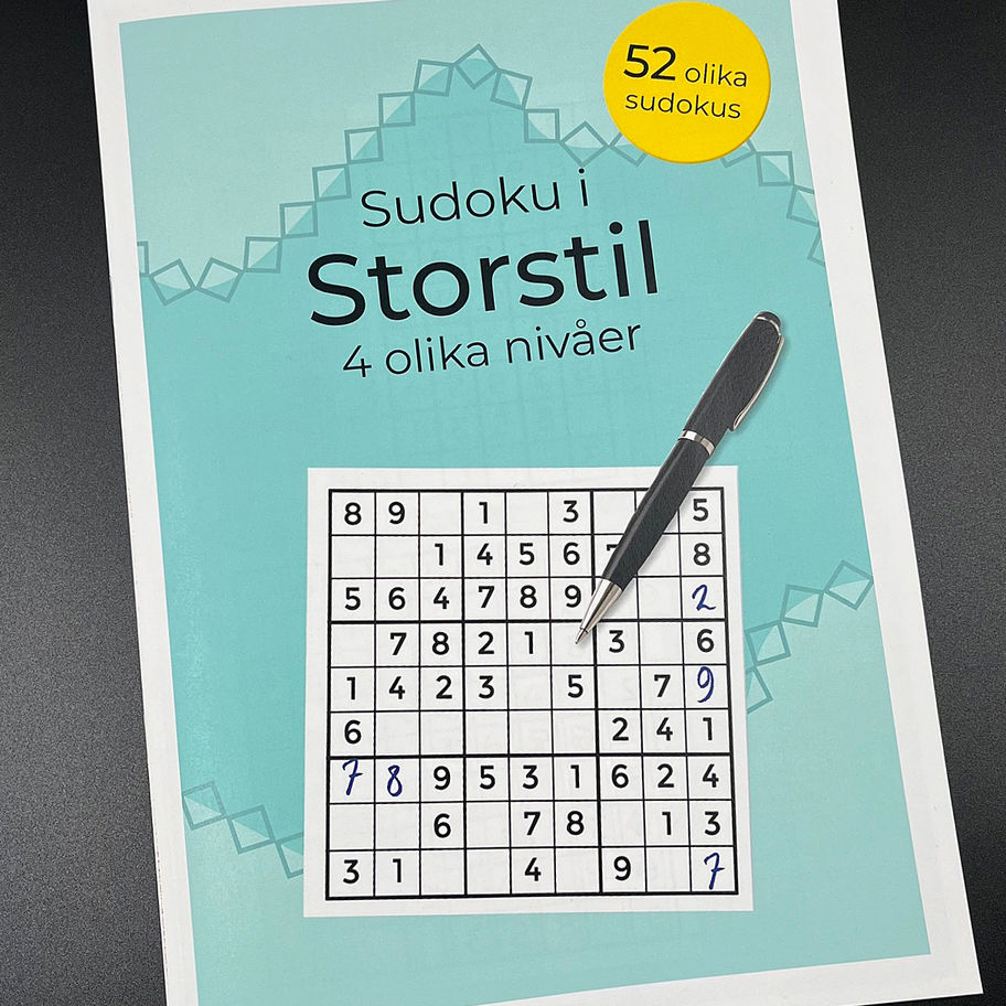 Sudoku i storstil, omslag med bild på ett sudoku och penna
