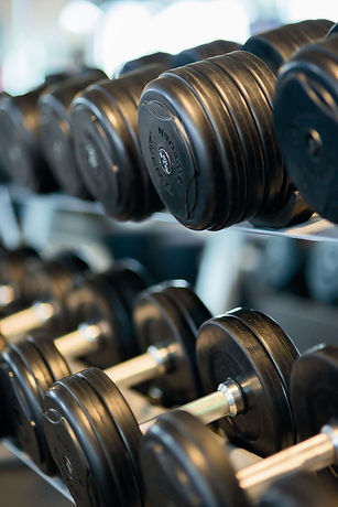 bodybuilding-close-up-dumbbells-260352.j