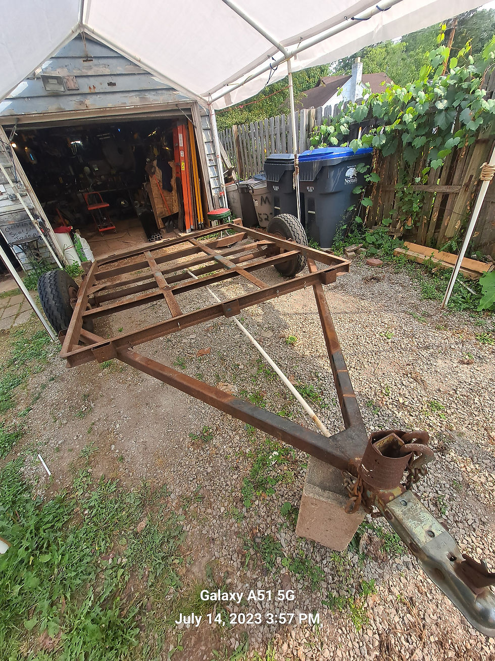 Front view old trailer broken frame