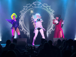 Live drag performance at Stardust Variety Show Cyprus with colourful costumes and theatrical stage lighting