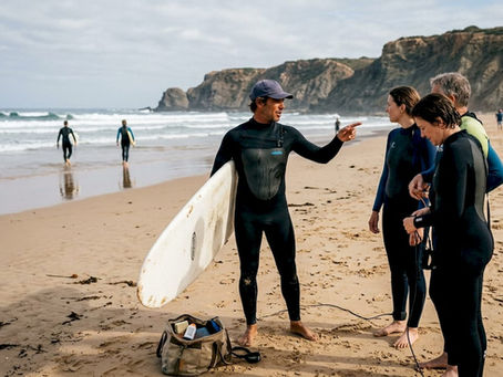 Surf instructor guiding beginners at beach