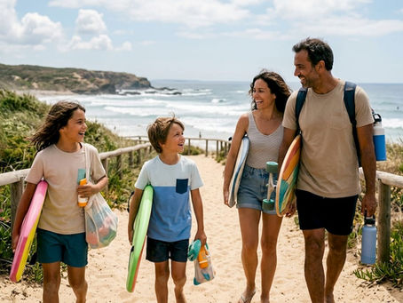 Family walking on accessible beach mat toward surf