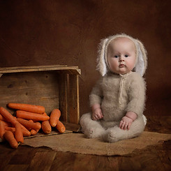 Baby dressed as a bunny photographed as part of an Easter Mini Portrait by Edinburgh based photographer Stork Photography