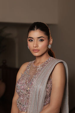 Woman in a formal dress posing for a photo, DHE Studio
