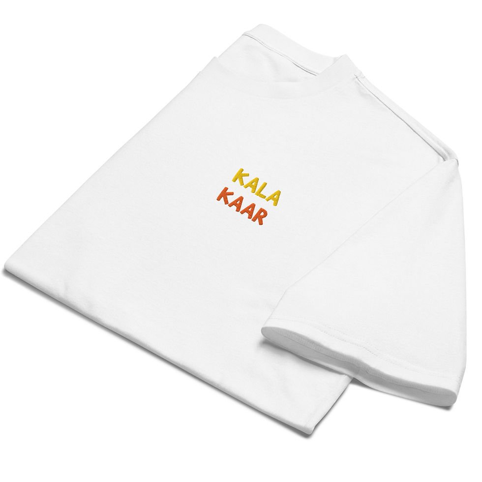 Thumbnail: White T-shirt folded, displaying the text KALA KAAR in yellow and orange.