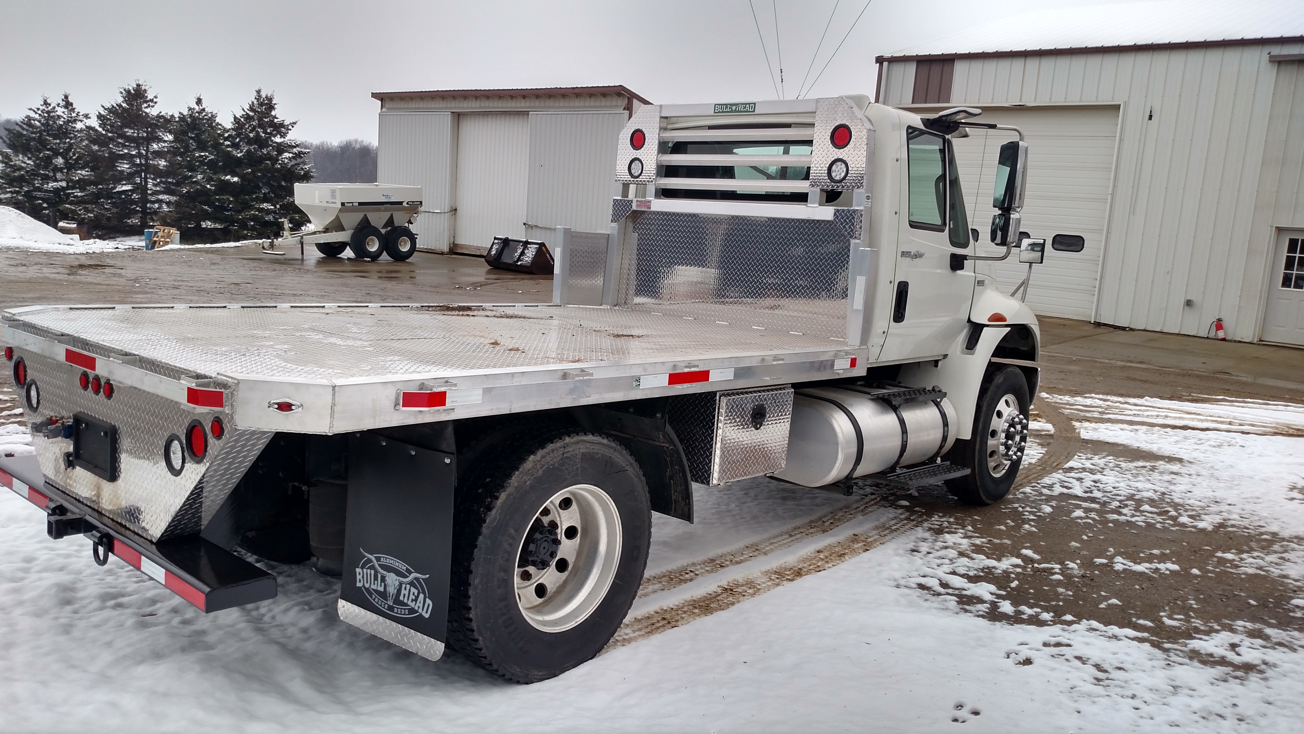 International with Aluminum Bed