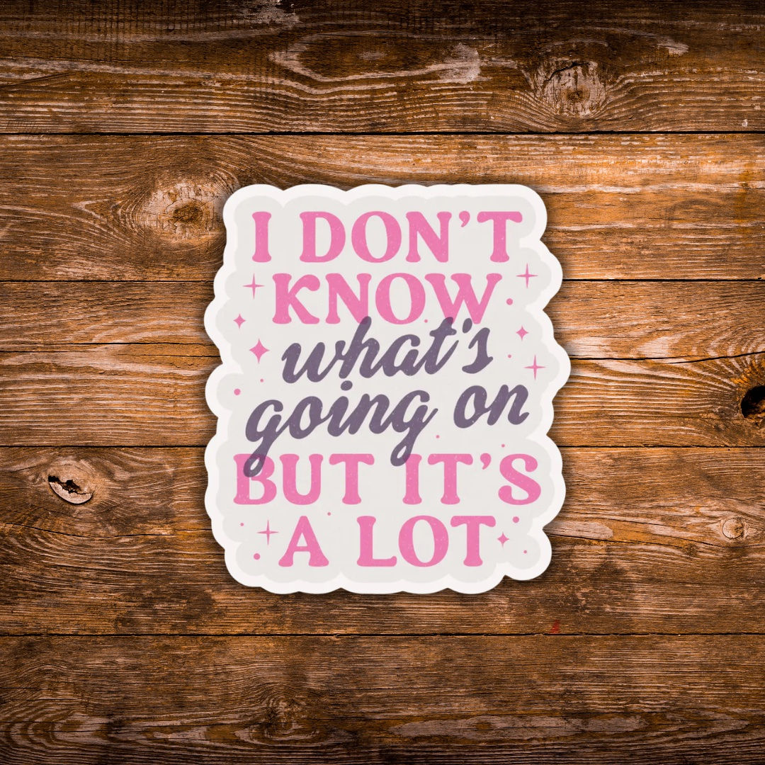 Funny quote sticker featuring the phrase “I Don't Know What's Going On But It's a Lot” in pink and purple lettering.