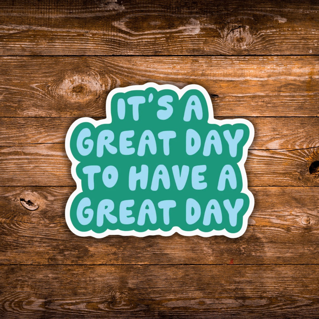 Positive quote sticker featuring the phrase “It's a Great Day to Have a Great Day” in blue lettering.