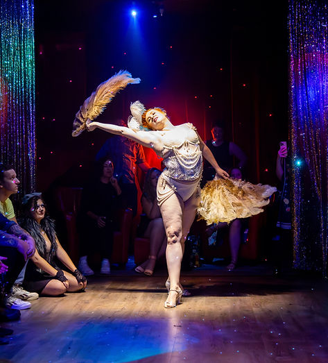 Knox Harter Performing With Feather Fans 