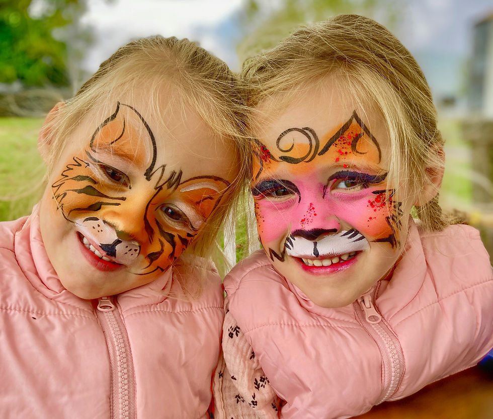 Lion and Cat - Face Painting by Diana Smith