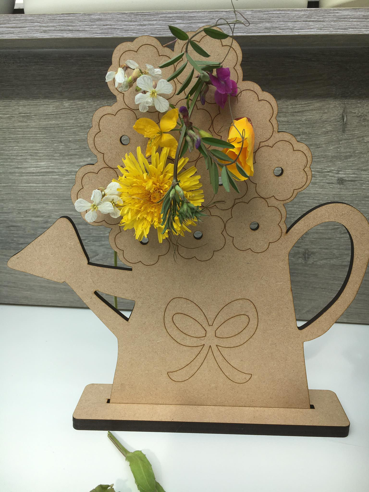 Houten bloemengieter