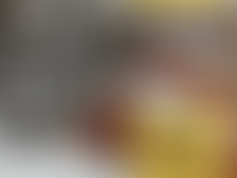 A cabin-type home covered in snow