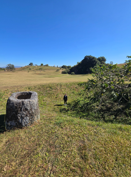 Standing in a bomb crater at the Plain of Jars, whose size and depth no photo could truly capture.