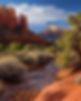 Sedona red rock with juniper trees near a small stream_.jpg