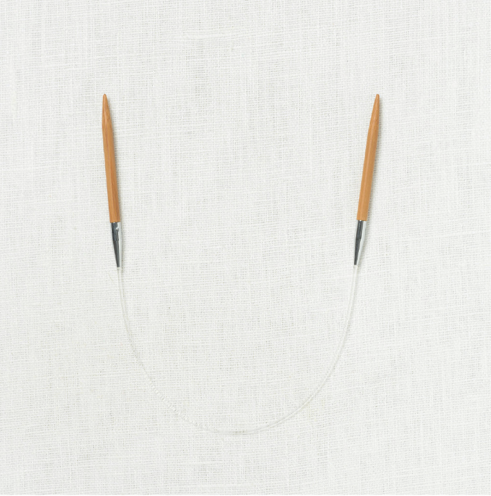 Circular knitting needles with wooden tips and clear cable
