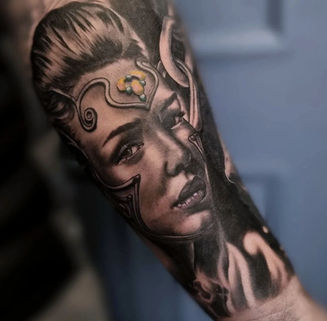 Black and grey viking woman tattoo