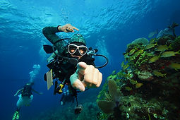 Scuba Diver pointing at the camera,doing the Divemaster PADI Course