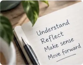 Notebook with handwritten words Understand, Reflect, Make sense and Move forward