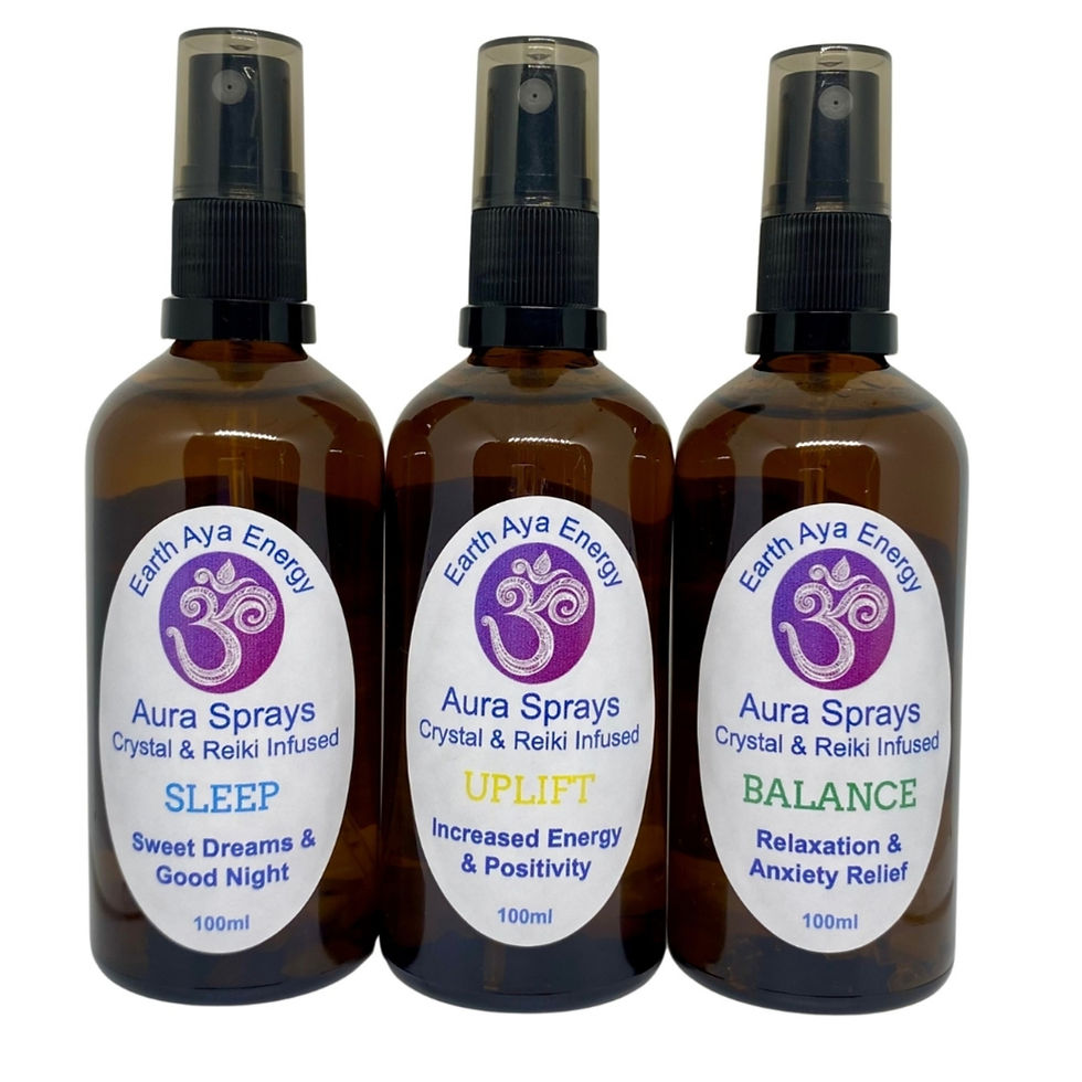 Aura Spray Trio in amber glass bottles, displayed with labels showcasing different blends for well-being