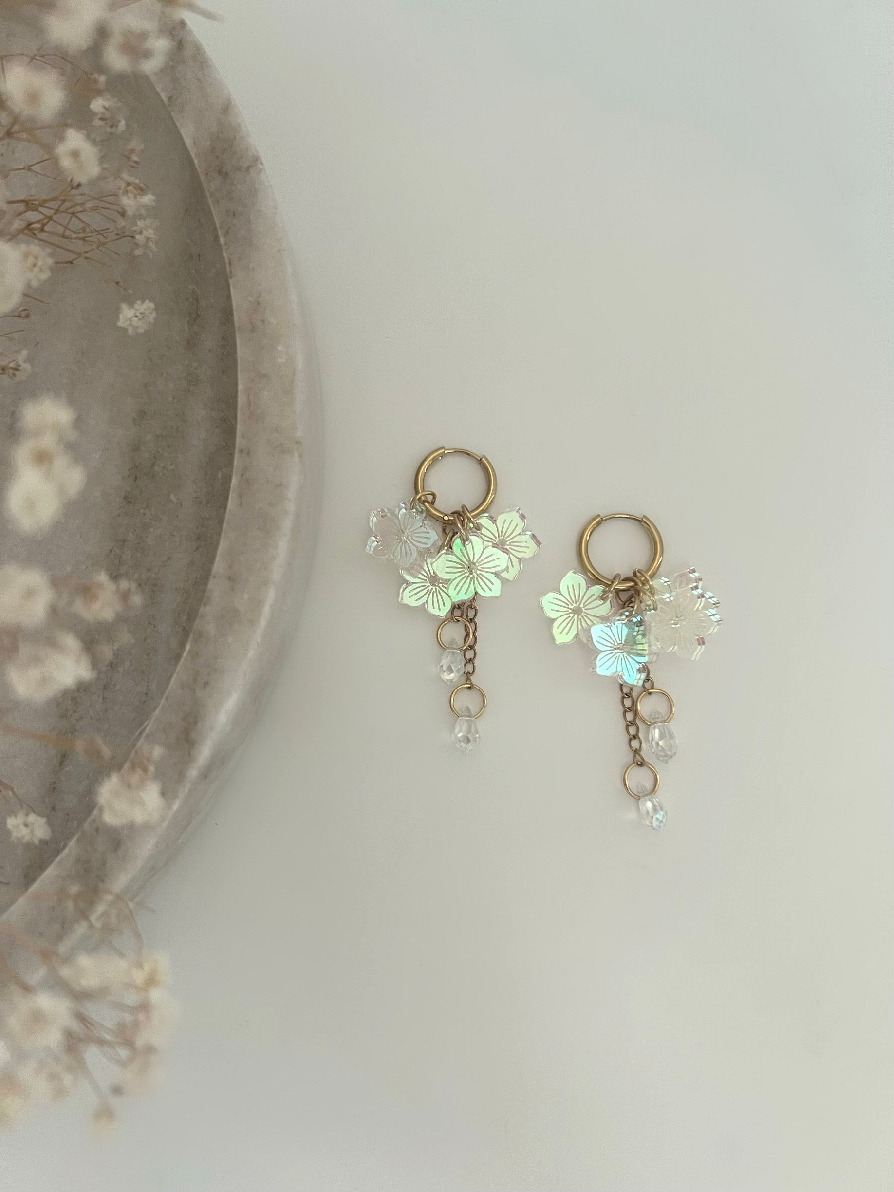 KUURANKUKKA - Med korvakorut ketjulla