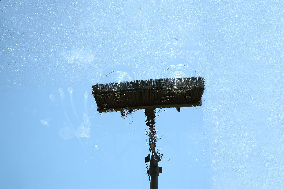 Window glass cleaning with pure water and extension pole. Washing and rinse using a reach