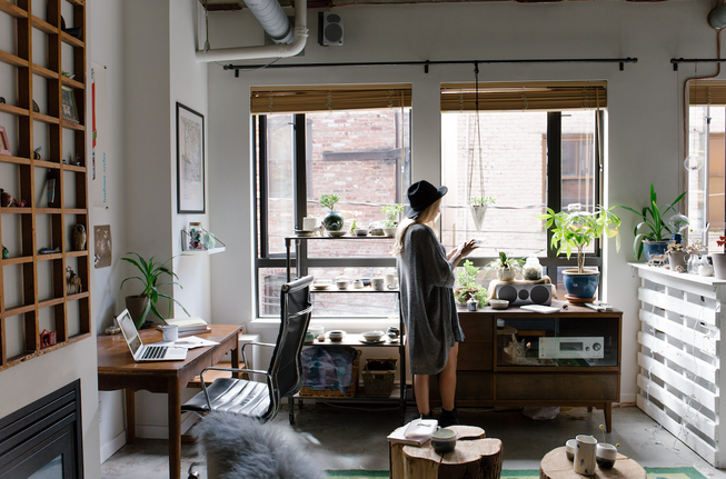 Person standing in fully furnished interior