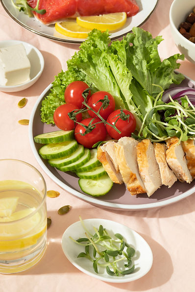 high-angle-plate-with-keto-diet-food-glass-water-with-lemon.jpg
