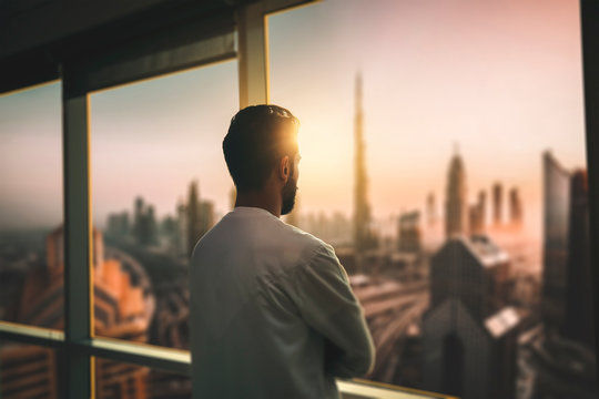 eecutive looking out o window (1).jpg