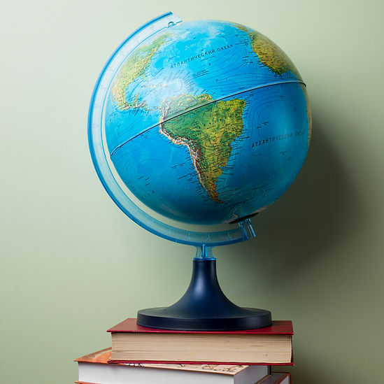 stacked-books-with-globe.jpg