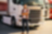 Portrait of young bearded man standing by his truck after completing a one way move.