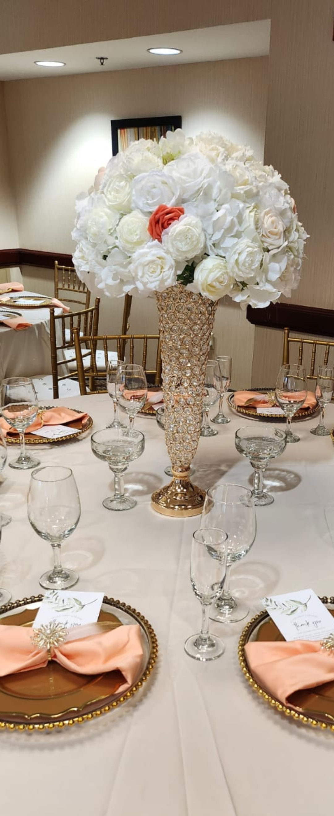 White customizable flower with gold beaded centerpiece.