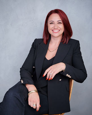 Relaxed personal branding photoshoot in an Auckland studio showing a confident female entr