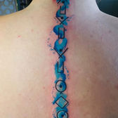 Spine Watercolor Tattoo