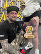 Artist Chris Cox with 1st place award