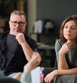 Couple sitting together during a counseling session.