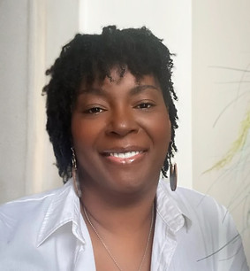 Professional headshot of Dr. Allie Thompson-Norman, therapist and founder of Realign Counseling & Consulting.