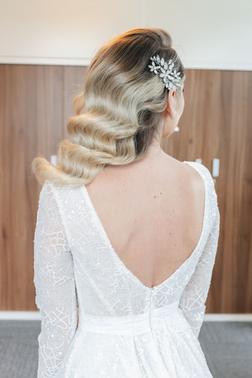 Detail shot of a bride's Hollywood waves and backless sequin wedding dress, professional wedding photography Knutsford.