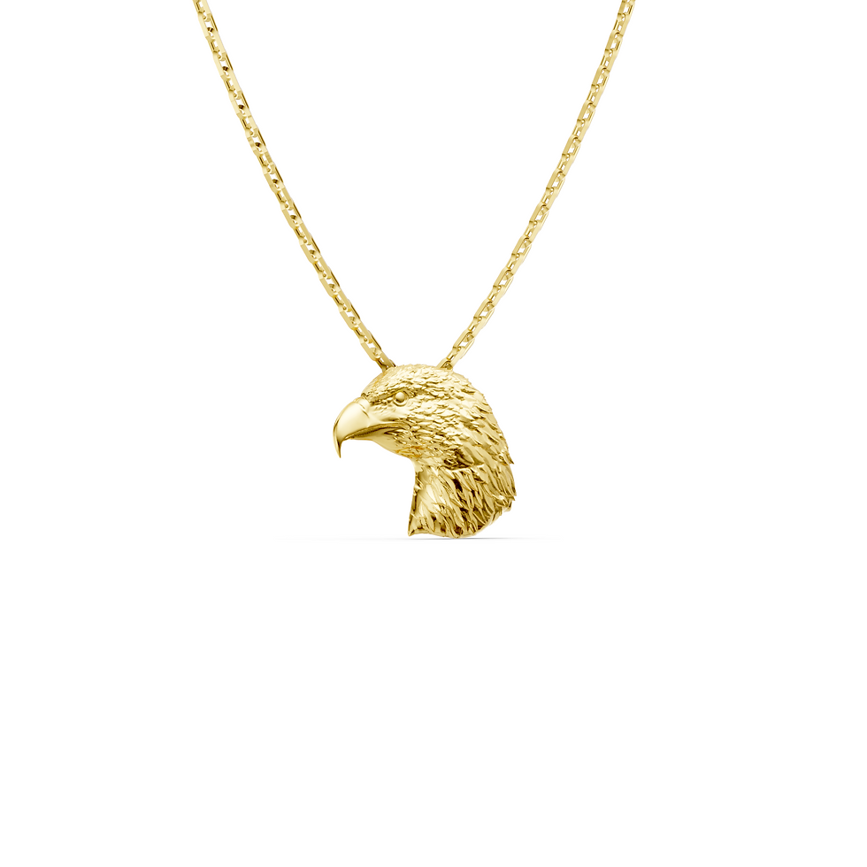 Yellow gold eagle head pendant in a detailed side view