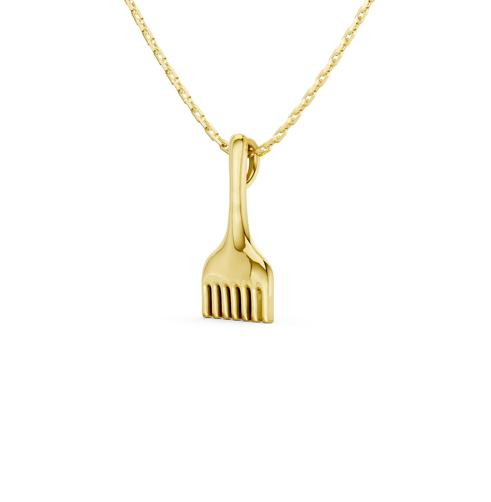 Yellow gold comb pendant in a detailed side view