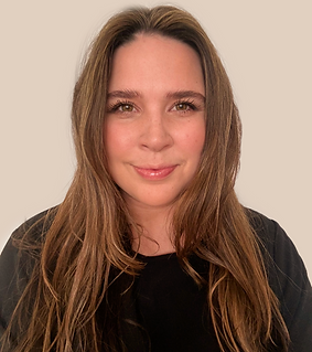 A woman with highlights smiling