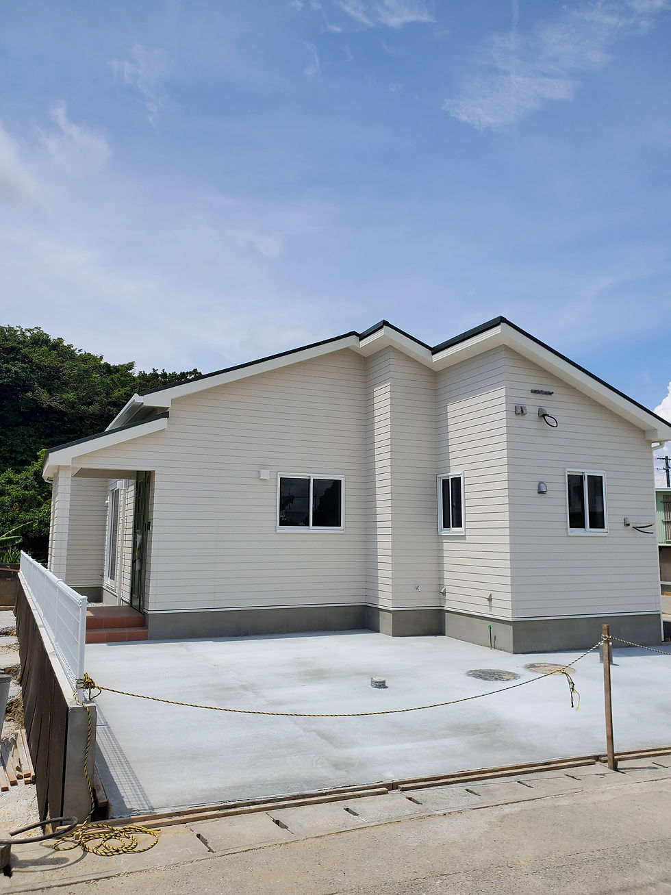 Eye-level view of wooden house exterior in Okinawa