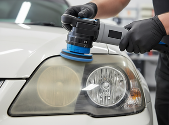 An auto detailer using a orbital buffer for headlight restoration