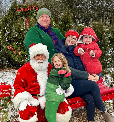 family Christmas portrait with Santa