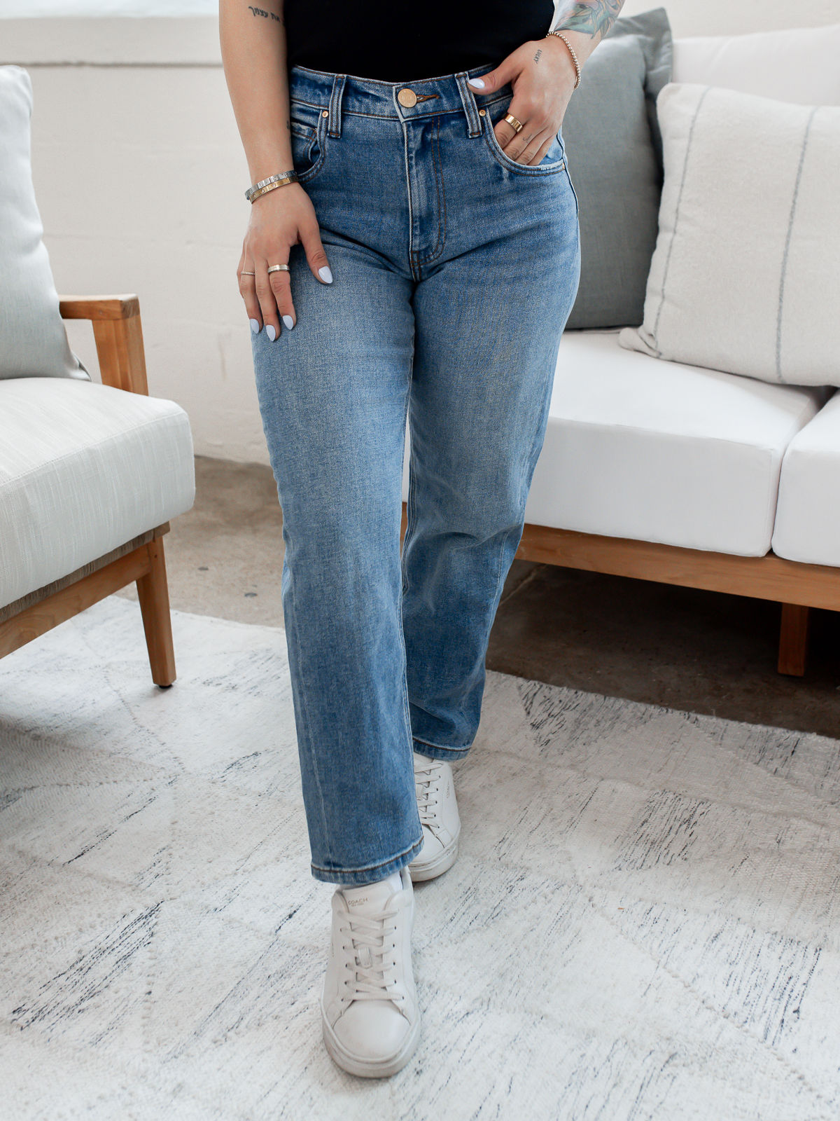 medium wash jeans detail view